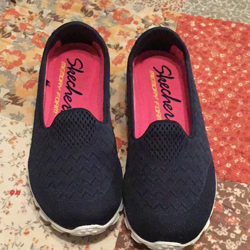 Black Sketchers slip ones with memory foam.